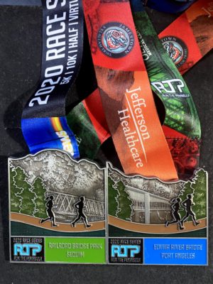 A photo of two of this year's Run the Peninsula race medals.