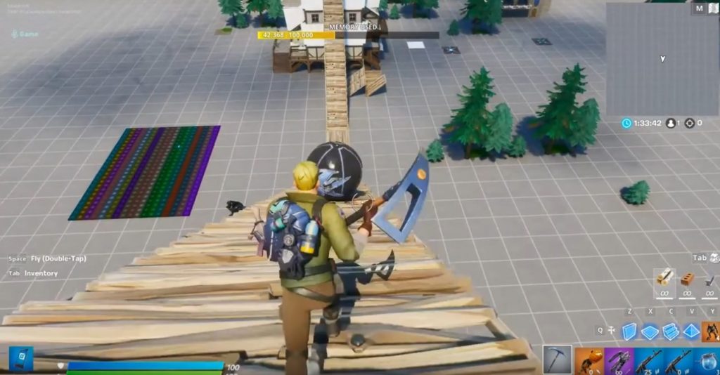 Screenshot of my Fortnite character on a ramp I created with a ball rolling down the ramp.