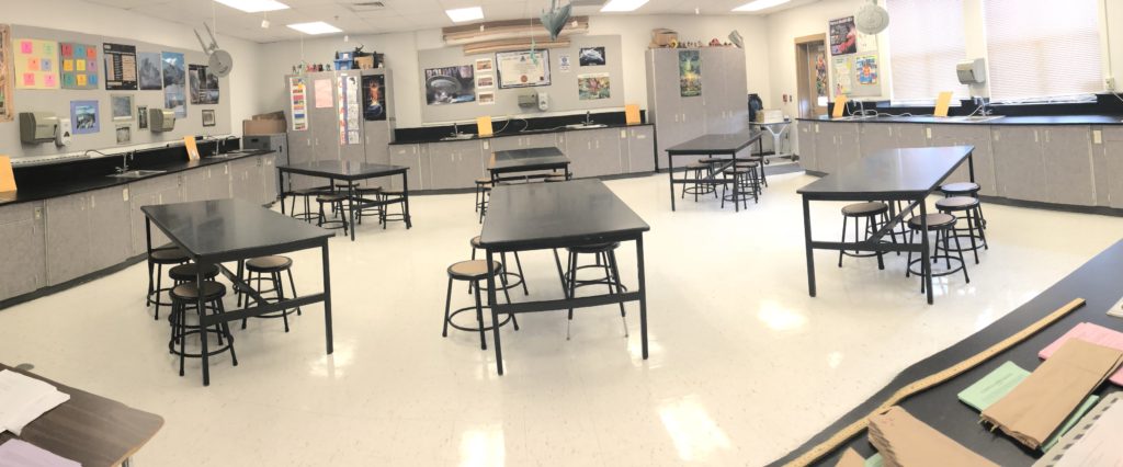 Six large Science tables in the classroom.