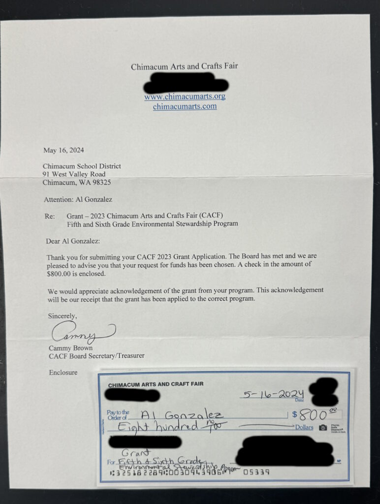 Grant acceptance letter and $800 check photo.